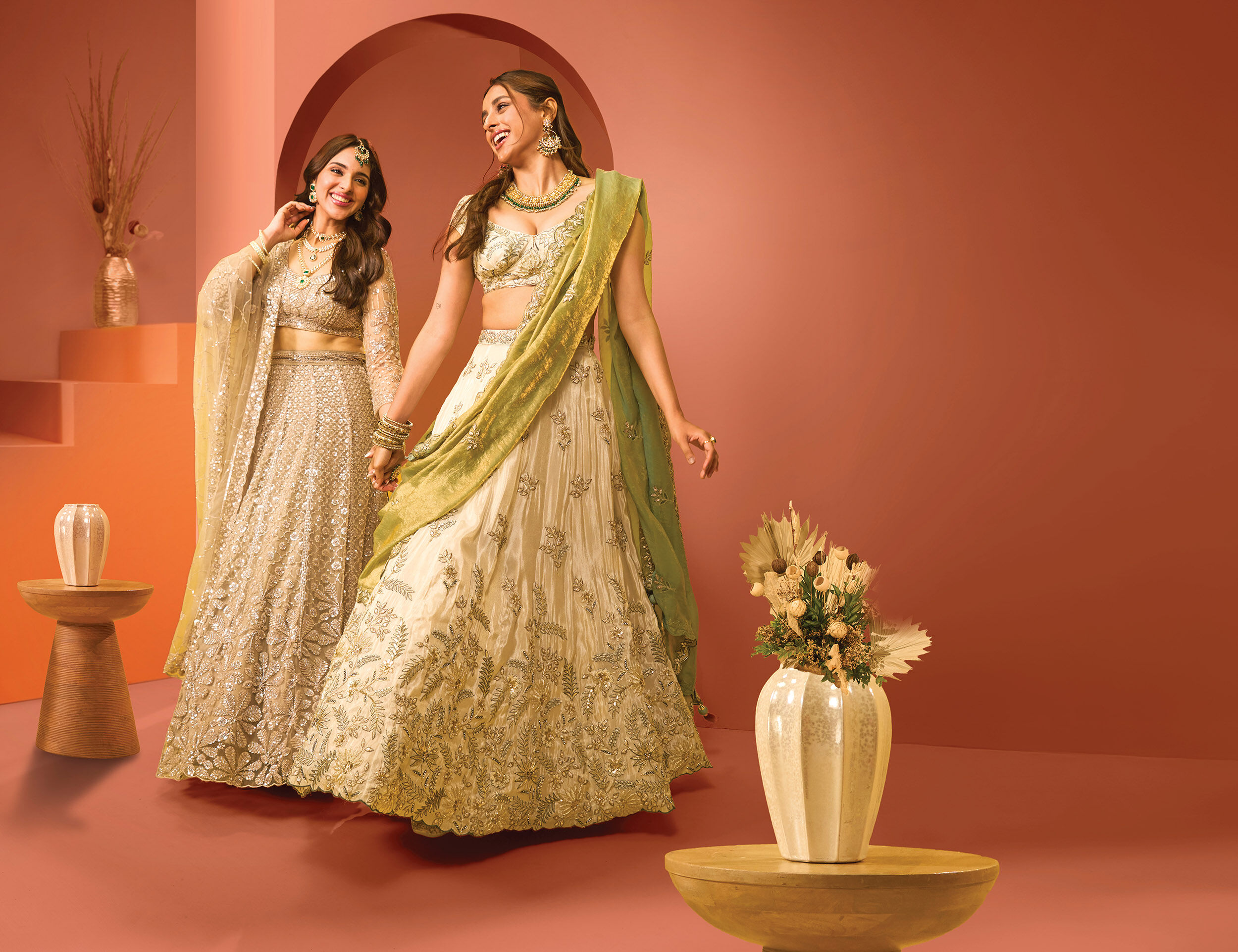 Womans flaunting their stylish pastal wedding lehengas for winter wedding 